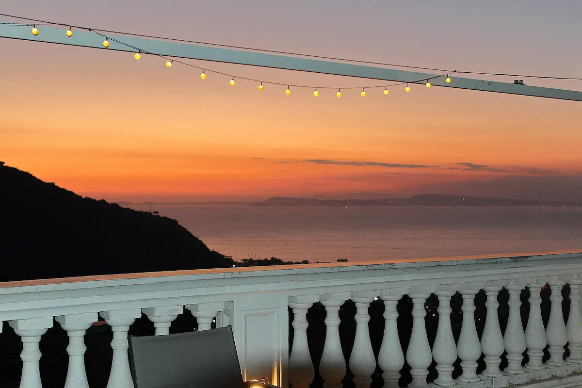 Panoramic terrace — sunset over the Gulf of Naples